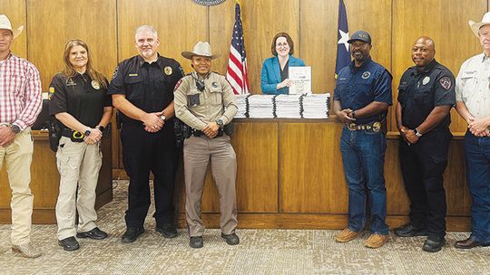 Austin County law enforcement receives updated manuals from district attorney's office