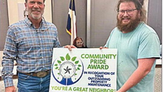 Burkhalter receives Community Pride Award