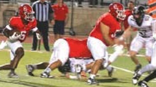 Columbus football cruises past Rogers