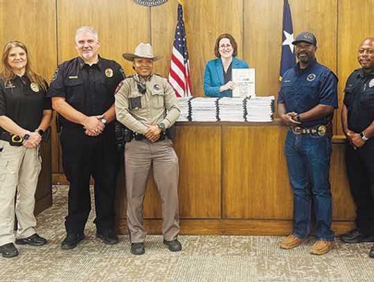 Austin County law enforcement receives updated manuals from district attorney's office