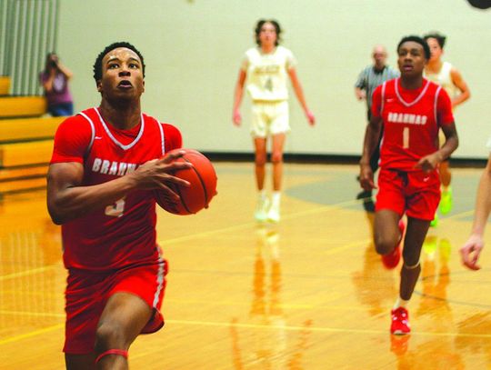 Bellville boy’s hoops holds off Sealy in OT thriller