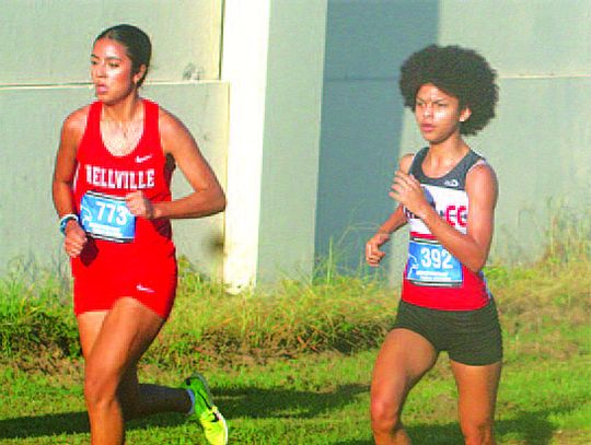 Bellville cross country runner Emma Freiermuht runs in a pack during the Sealy meet September 21 at Sealy High School