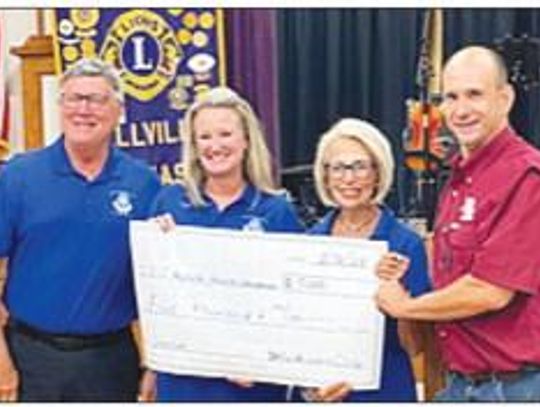 The Bellville Hospital Foundation received a $5,000 check from the Bellville Lions Club during the Lions Fifth Thursday Family Night. Courtesy photo