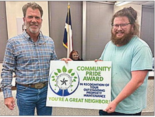 Burkhalter receives Community Pride Award