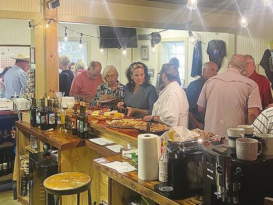 Fayetteville chamber mixer packs Blue Mule