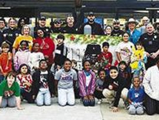 Kids and cops shop together