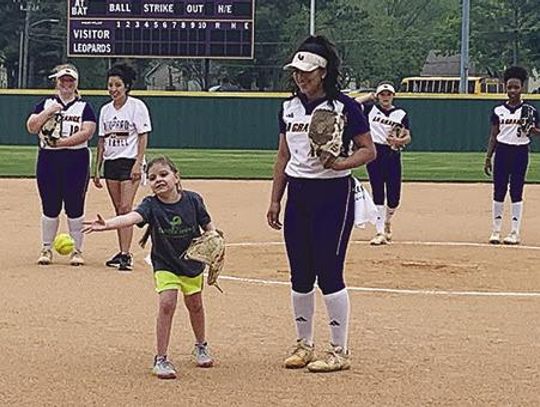 Kylie throws out first pitch for La Grange Softball