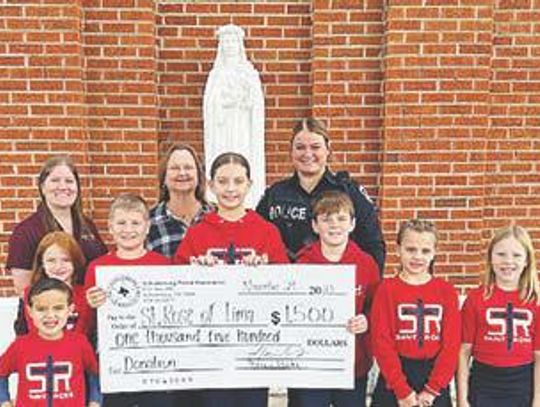 Schulenburg Police Association donates to St. Rose of Lima