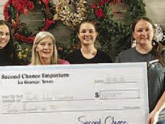 Second Chance Emporium donates to Turtle Wing