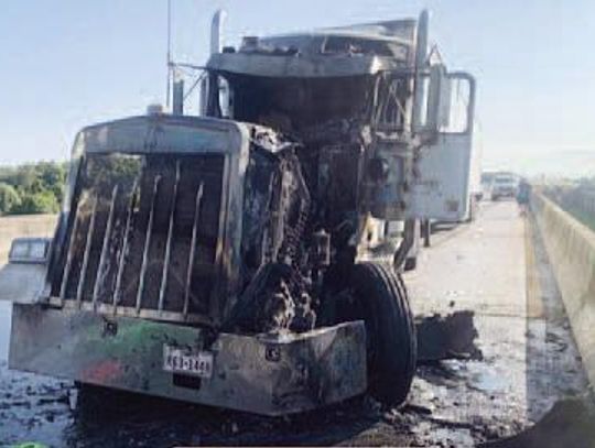 Truck in flames on I-10