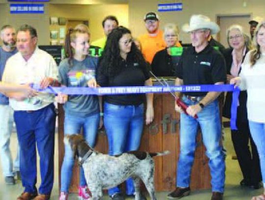 Yoder and Frey Heavy Equipment Auction holds ribbon cutting