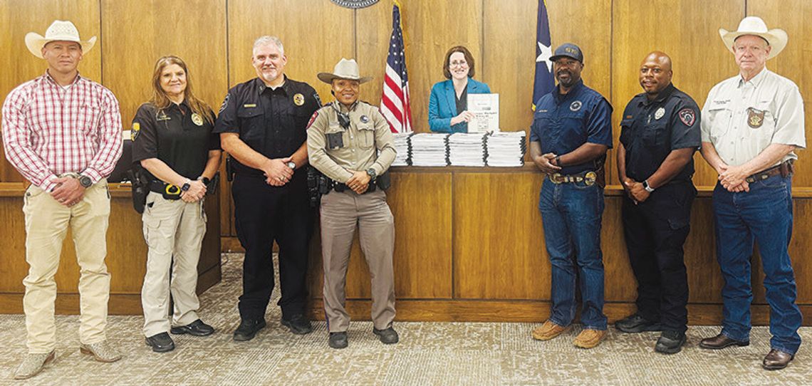 Austin County law enforcement receives updated manuals from district attorney's office