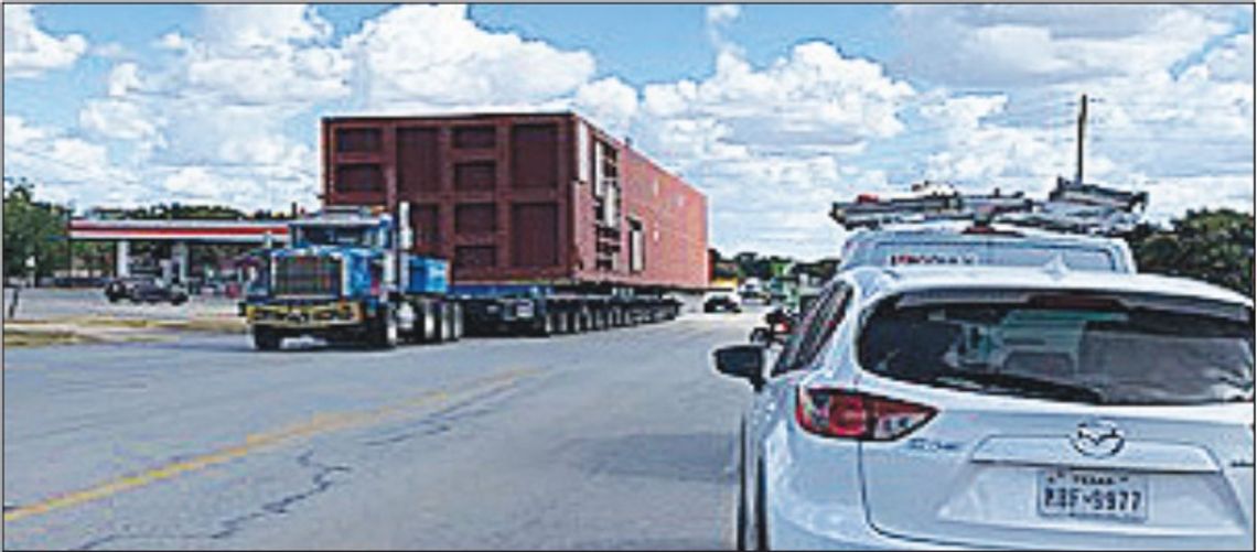 Big load rolling down  the highway…slowly