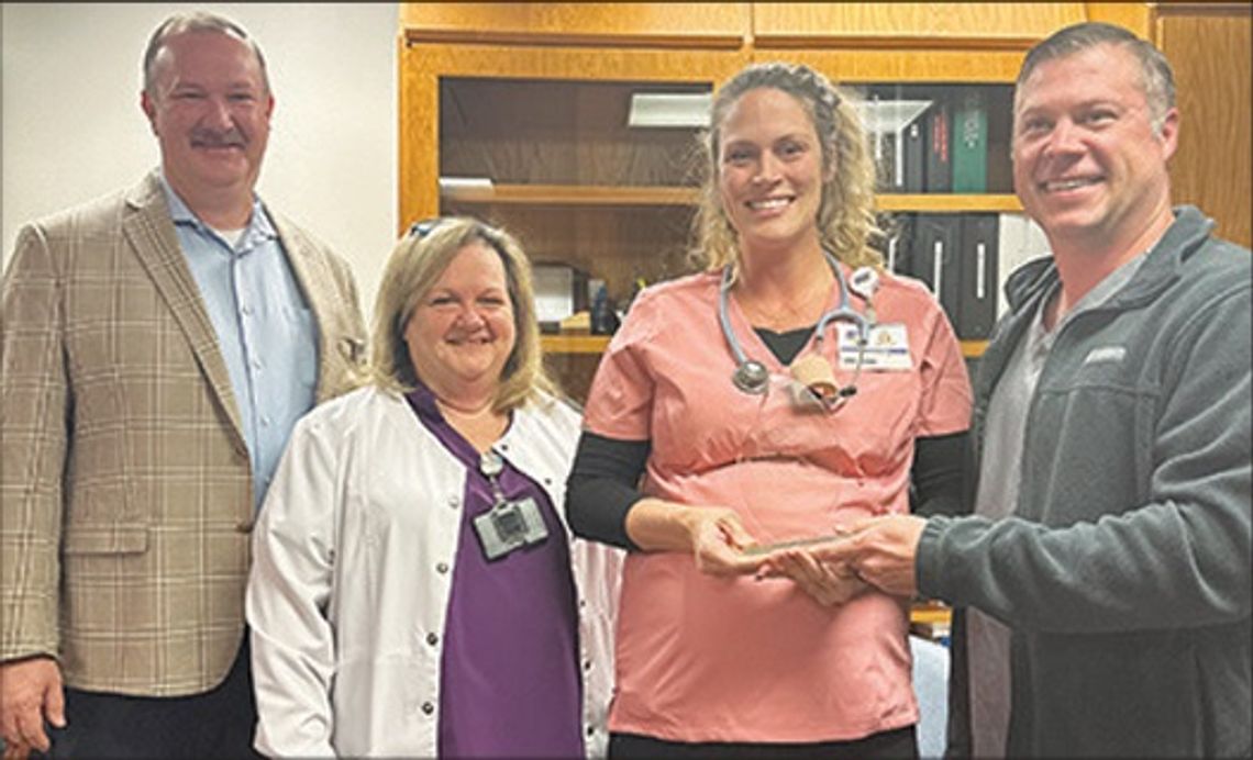 Camie Kuhn receives award Camie Kuhn receives award